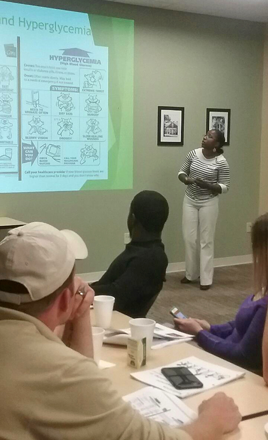 VGCC Pharmacy Technology student Tamika Everett of Creedmoor makes a presentation to foster parents at Granville County DSS.