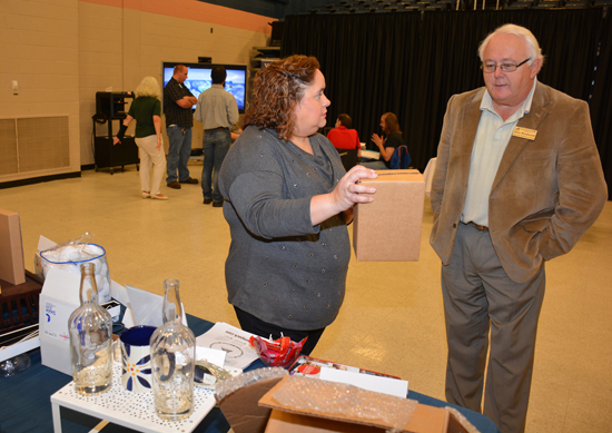 Theresa Chiplis (left) from WMR Packaging & Design talks with Steve Woodworth, head of VGCC’s Global Logistics & Distribution Management program, during the Business Technologies Fair. Chiplis, a graduate of the Global Logistics program, works for WMR as a Systems/Logistics Specialist based at the company’s Creedmoor location. (VGCC photo)