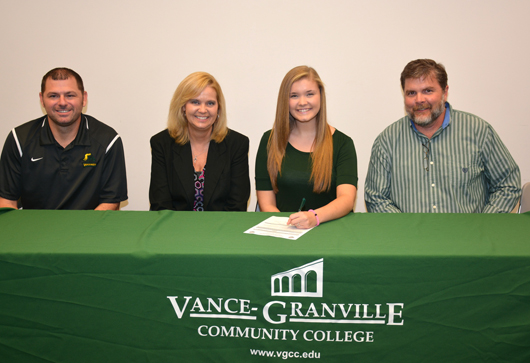 Hanna Williams of Oxford (third from left) signs her letter of intent to join the women’s volleyball team at Vance-Granville Community College. Joining her are, from left, VGCC Coach Christopher Young, her mother, Lisa Williams and her father, Whit Williams. (VGCC photo)