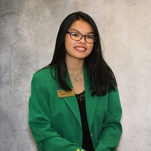 Bethany Lee smiling in ambassador green jacket