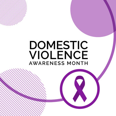 Purple ribbon with Domestic Violence Awareness Month as text.