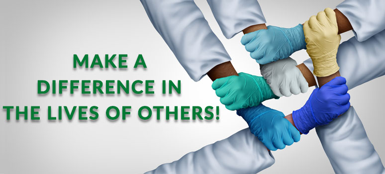 Making a difference in the lives of others! Arms of medical professionals locking together.