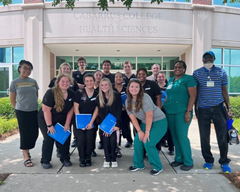 VGCC Health Sciences students pose in front of Cabarrus College of Health Sciences