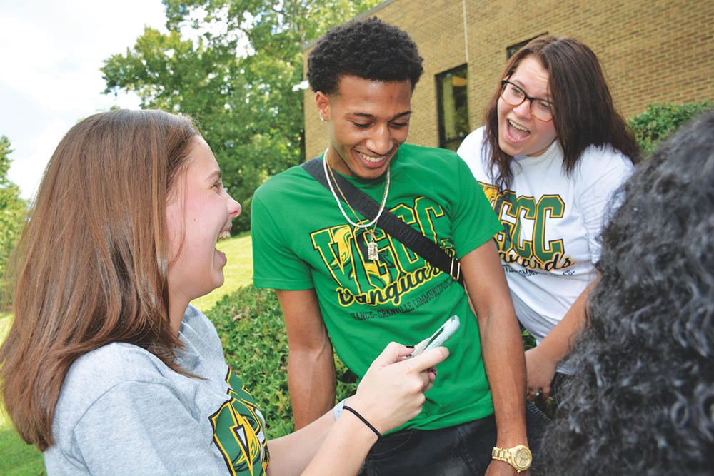 VGCC students laughing in the main campus courtyard