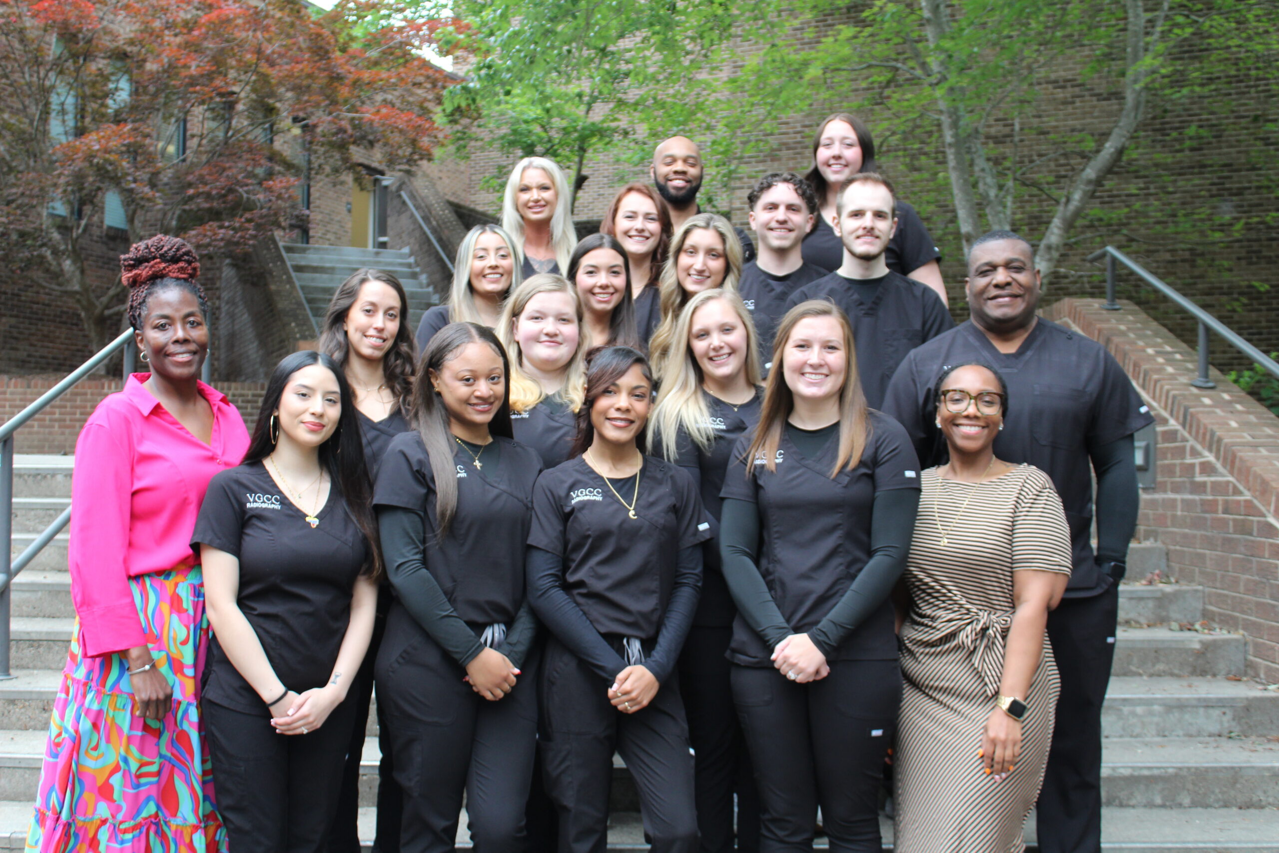 A group photo of the 2026 Radiography Graduates on the steps outside of VGCC's Main Campus Civic Center.