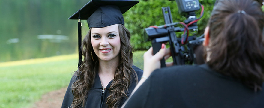 young lady smiling for graduation picture after completing a career pathway at VGCC