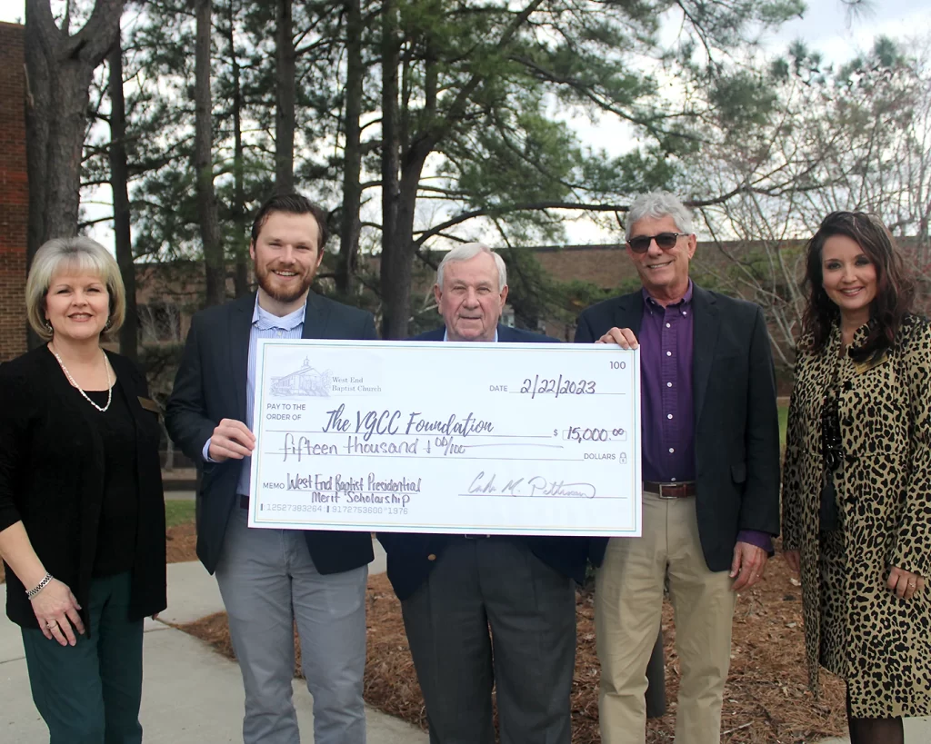 Representatives from West End Baptist Church present a check to The VGCC Foundation