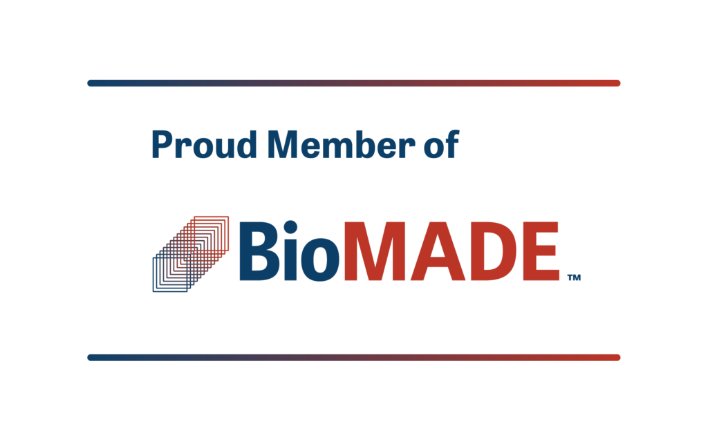 The text 'Proud Member of' written above the blue and red BioMADE logo