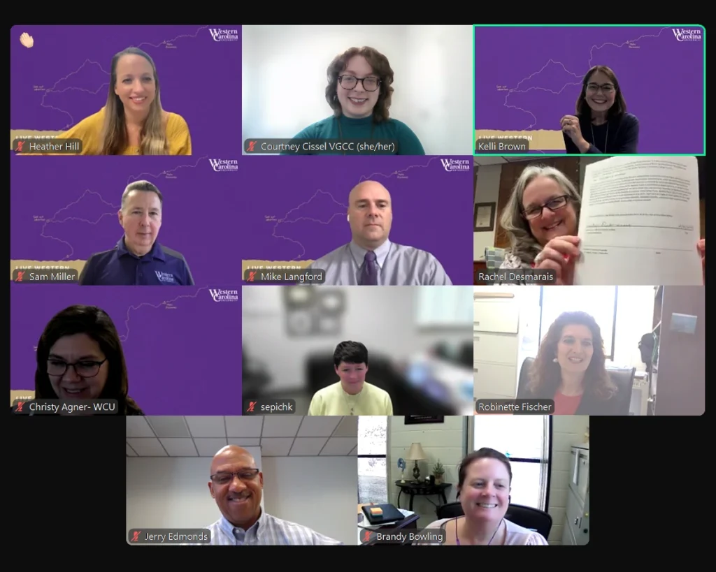 A screenshot of a video call during which representatives from VGCC and WCU signed a transfer partnership