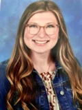Yearbook-style portrait of Beginning Teacher Melissa Johnson, a young woman with long blond hair, glasses, and a toothy smile.