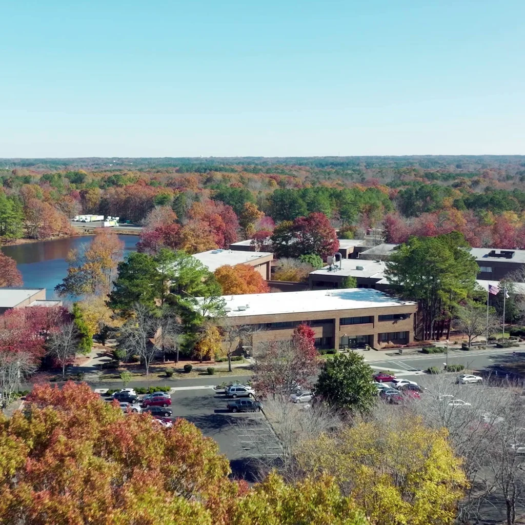 Aerial shot showing the buildings and grounds of Vance-Granville Community College's Henderson NC campus on an autumn day.